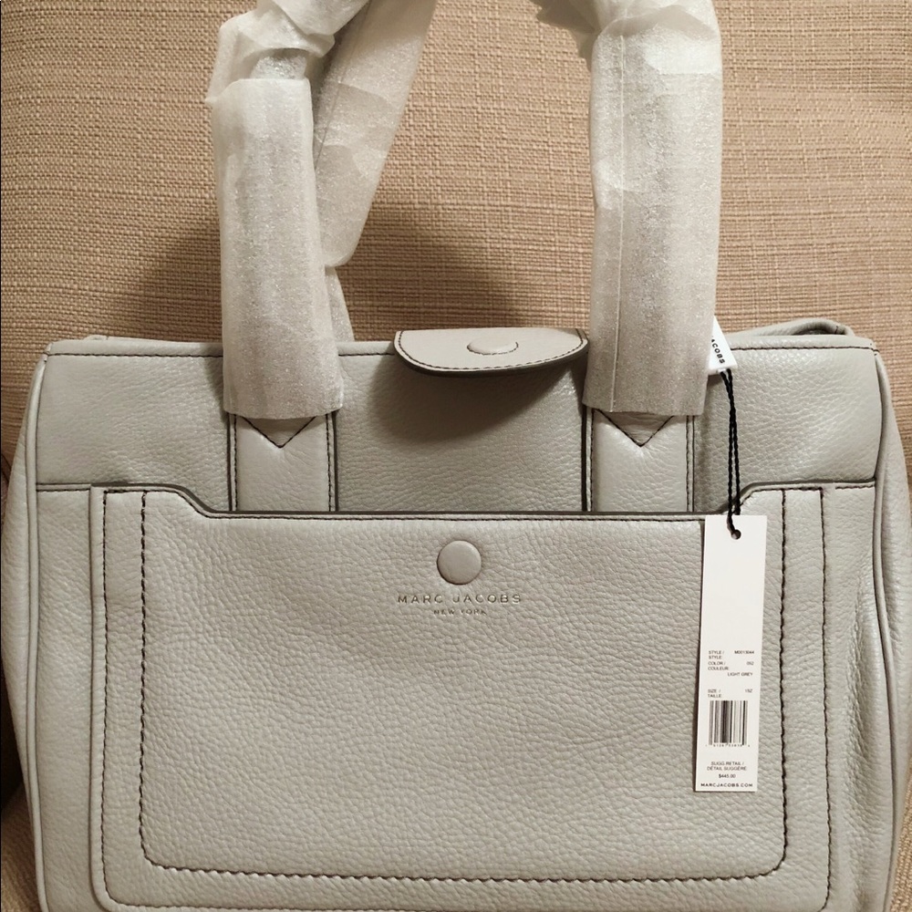 Brand new Marc Jacob, too big for my size.